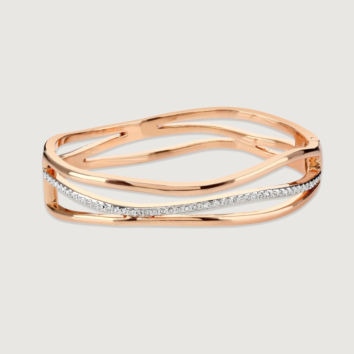 Flowing waves of warm rose gold plating enhanced by a shimmering central wave of white crystals make this clasp-opening Bayswater bangle contemporary and luxurious. This collection has a beautiful fluid quality that is sure to make a true style statement 