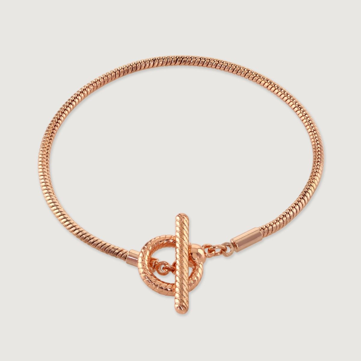 The Rose Gold Rope Style T-Bar Bracelet is a stunning and sophisticated accessory. With its intricate rope-style design in radiant rose gold, this bracelet exudes timeless elegance. The T-Bar centrepiece adds a touch of charm and style, making it a versat