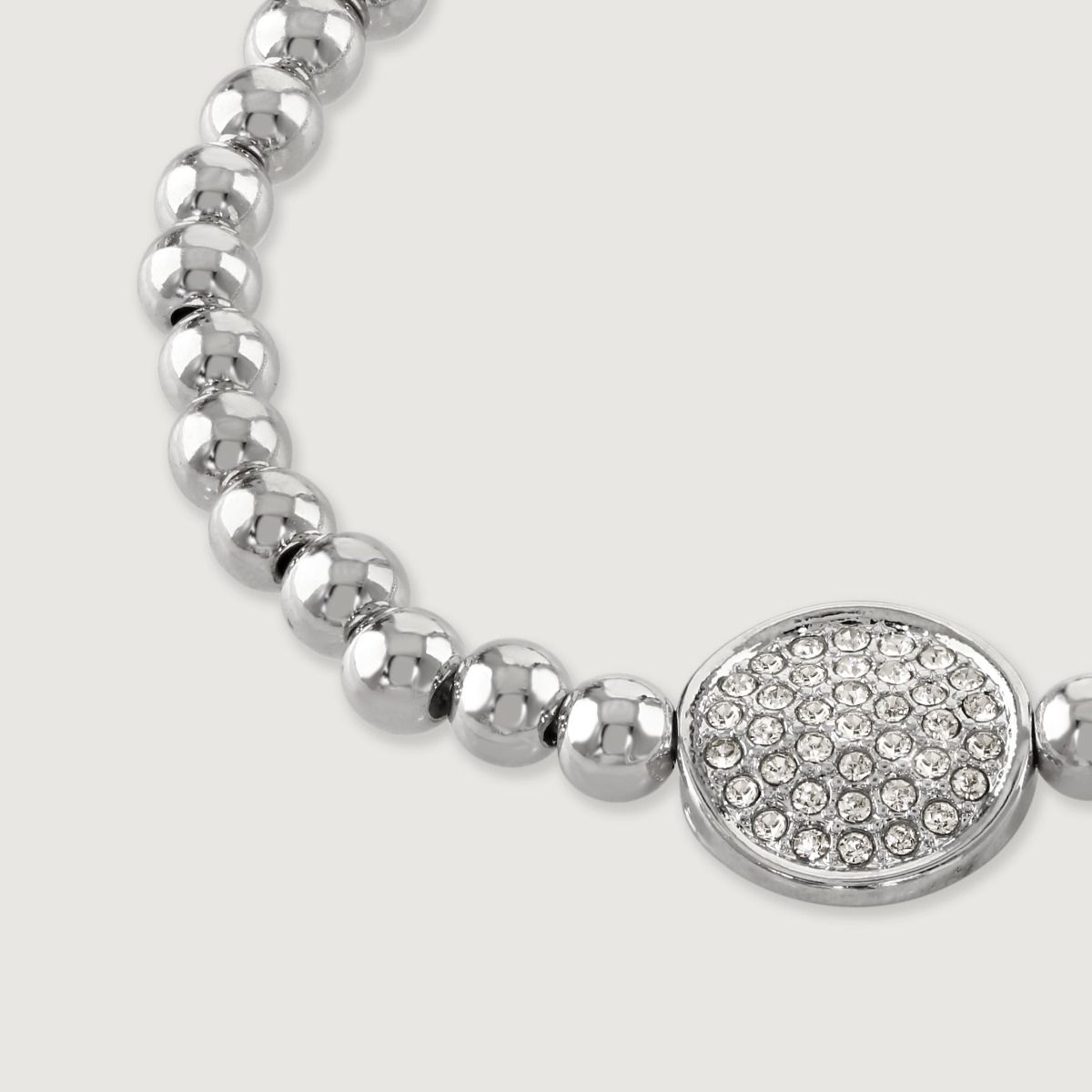 This stylish beaded friendship bracelet features a sparkling pave disc, adding a touch of elegance to its vibrant design. Handcrafted with care, it embodies the spirit of unity and connection. 
