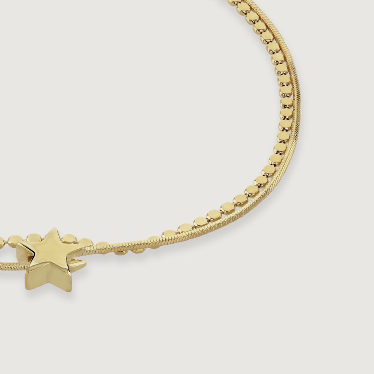 Elevate your style with this stunning double chain bracelet adorned with a star charm. Its delicate design adds a touch of celestial elegance to any outfit. Handcrafted with meticulous detail, it serves as a reminder to reach for the stars and embrace you