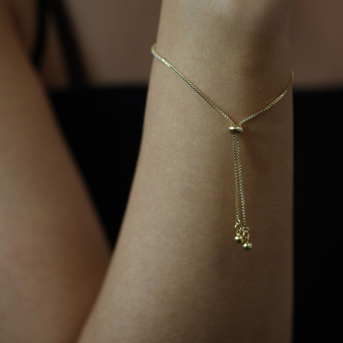 Experience the perfect blend of elegance and friendship with this gold crystal line and box chain bracelet. The shimmering crystals add a touch of glamour, while the box chain represents strength and unity. Handcrafted with love, it symbolises everlasting