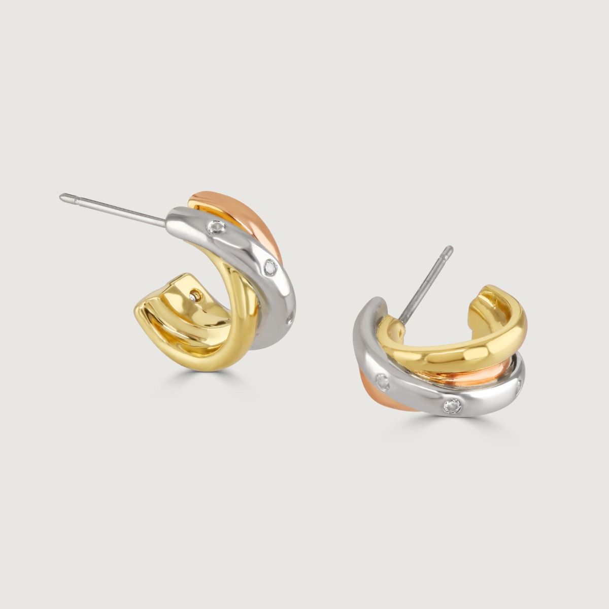 Part of our award-winning Russian Trio Set. Each individual band is plated with either gold, rose gold, or rhodium to create the three colors. Each piece is then hand-polished to give a high lustre. The stones are hand-set clear cubic zirconia. 