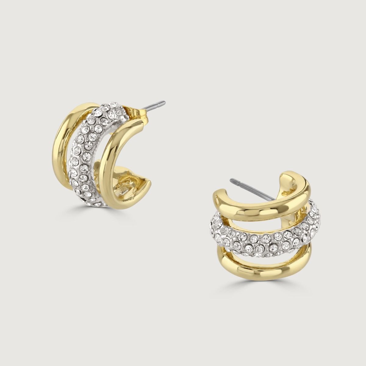 These beautiful half hoop earrings from the Aspire collection will add sophistication to any outfit. Featuring shimmering pave set crystals set into rhodium plating, wrapped between two bands of polished gold