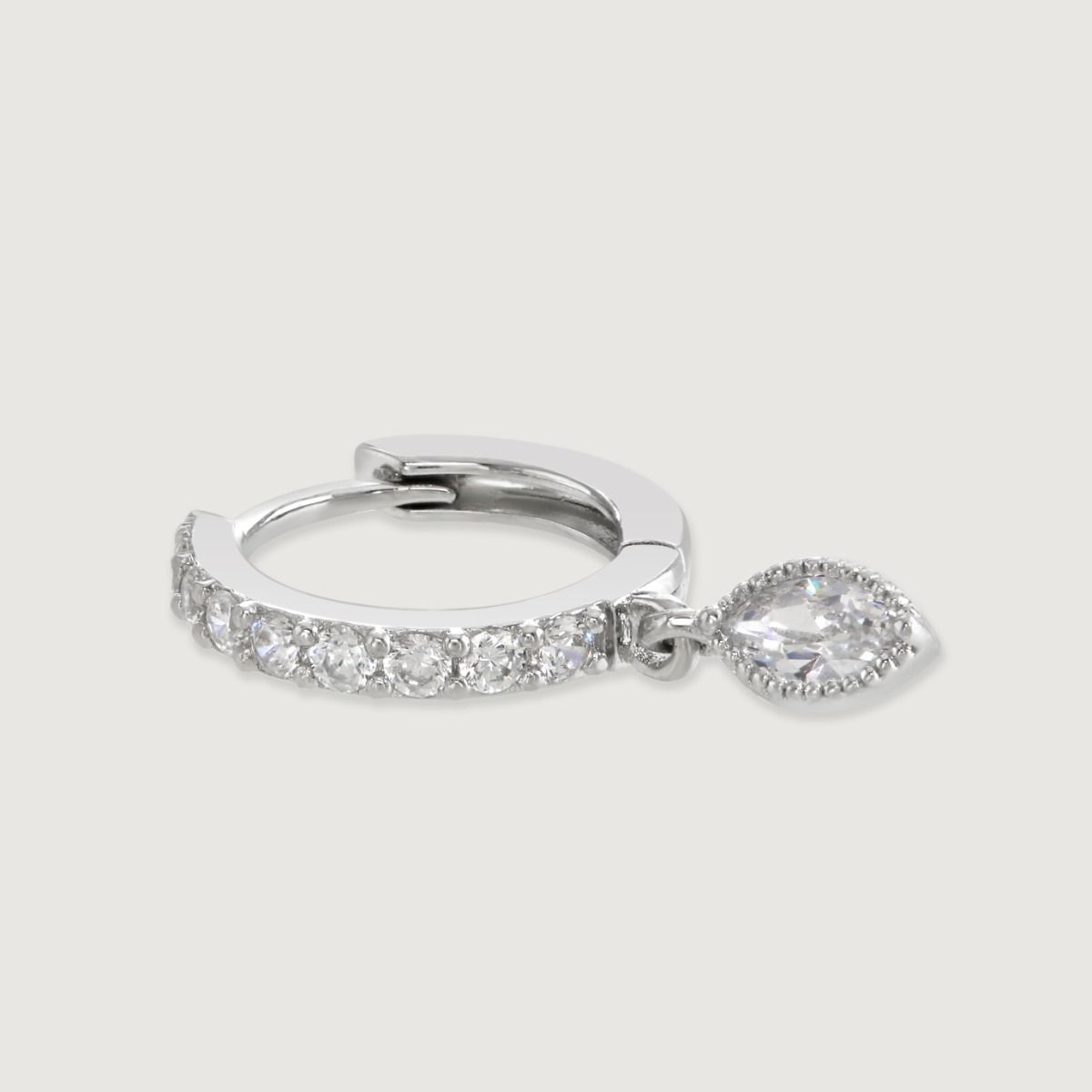 Elevate your elegance with the Silver Marquise Diamond Hoop Earrings. Its encrusted cubic zirconia hoops glisten, accentuating a captivating marquise drop. An exquisite blend of sophistication and charm for any occasion.