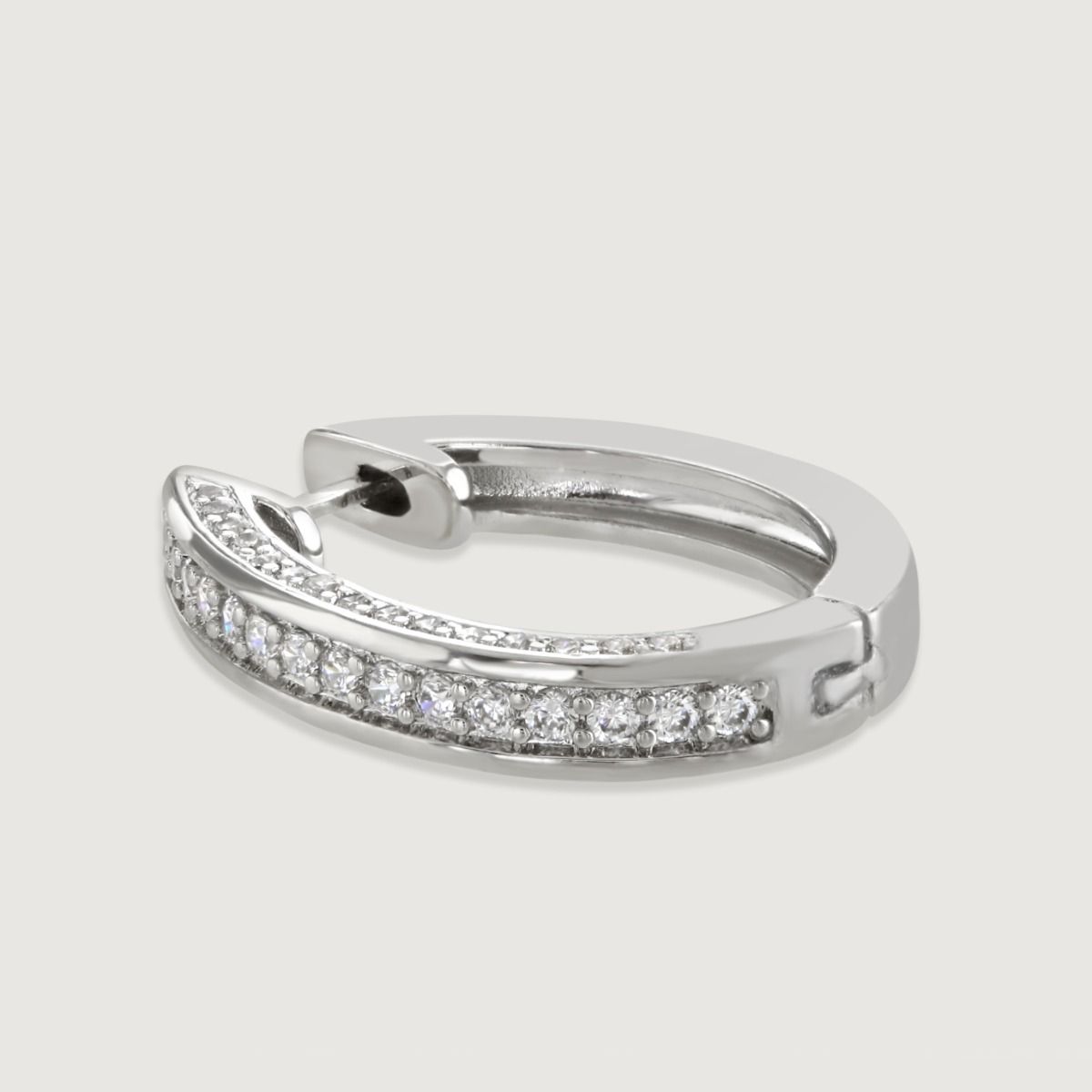 Elevate your style with the Pave and Polished Hoop. This timeless hoop design sparkles with cubic zirconia stones adorning one side, while the hinge onward showcases a sleek, polished band. A perfect blend of elegance and simplicity for a sophisticated lo