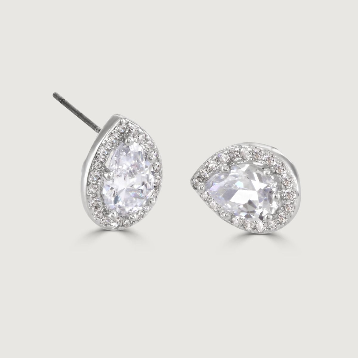 These beautiful stud earrings are set with flawlessly cut cubic zirconia stones, surrounding a dazzling oval cut centre stone. Wear to add timeless glamour to any look.