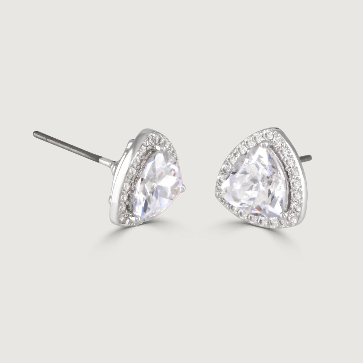 These dazzling stud earrings are set with a halo of flawlessly cut cubic zirconia stones, surrounding a sparkling trillion cut clear centre stone. Wear to add timeless glamour to any look.