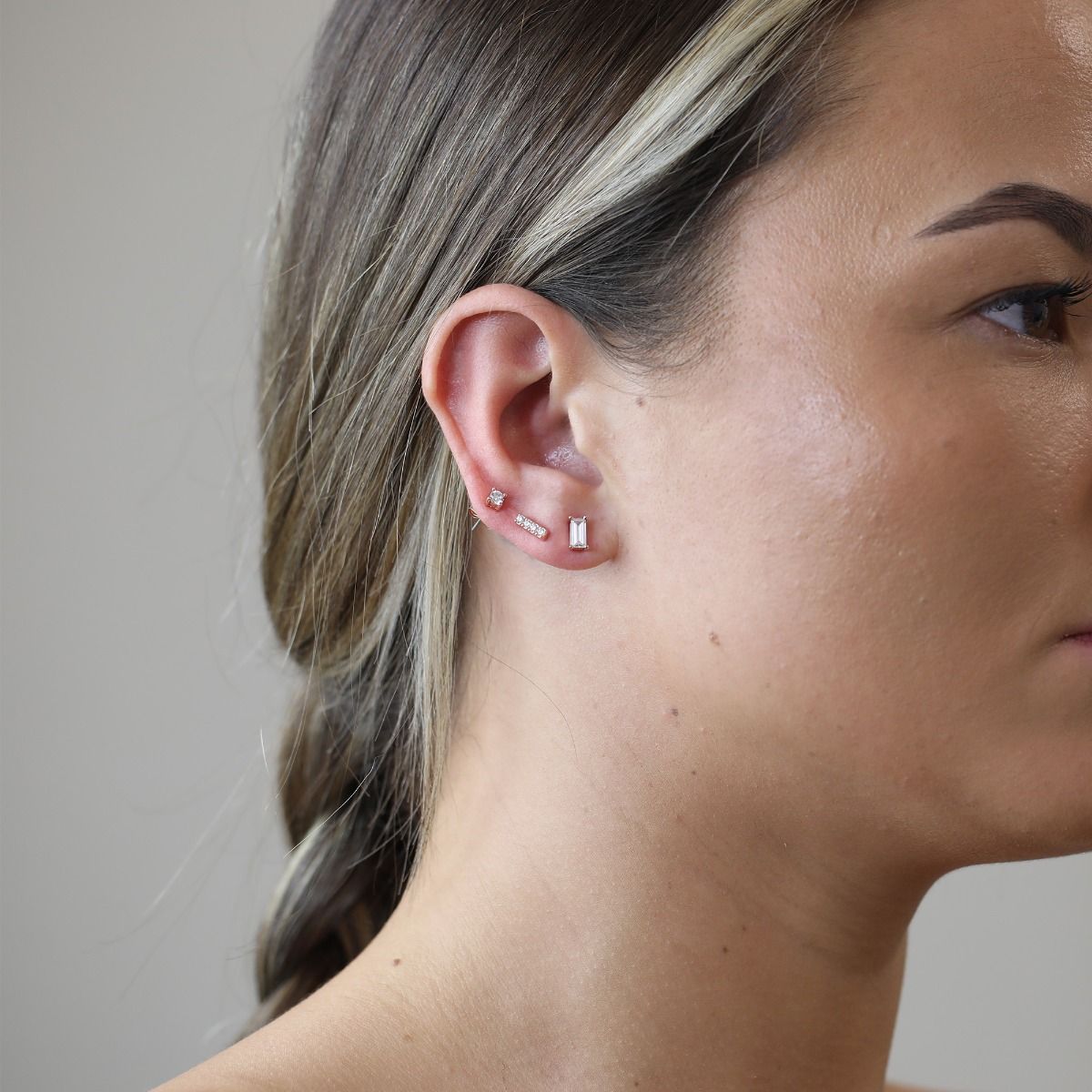 The Set of Three Crystal Earrings are an everyday necessity as they pair rose gold with clear crystals to make a subtle statement. Wear separately or mix and match to customise your look.