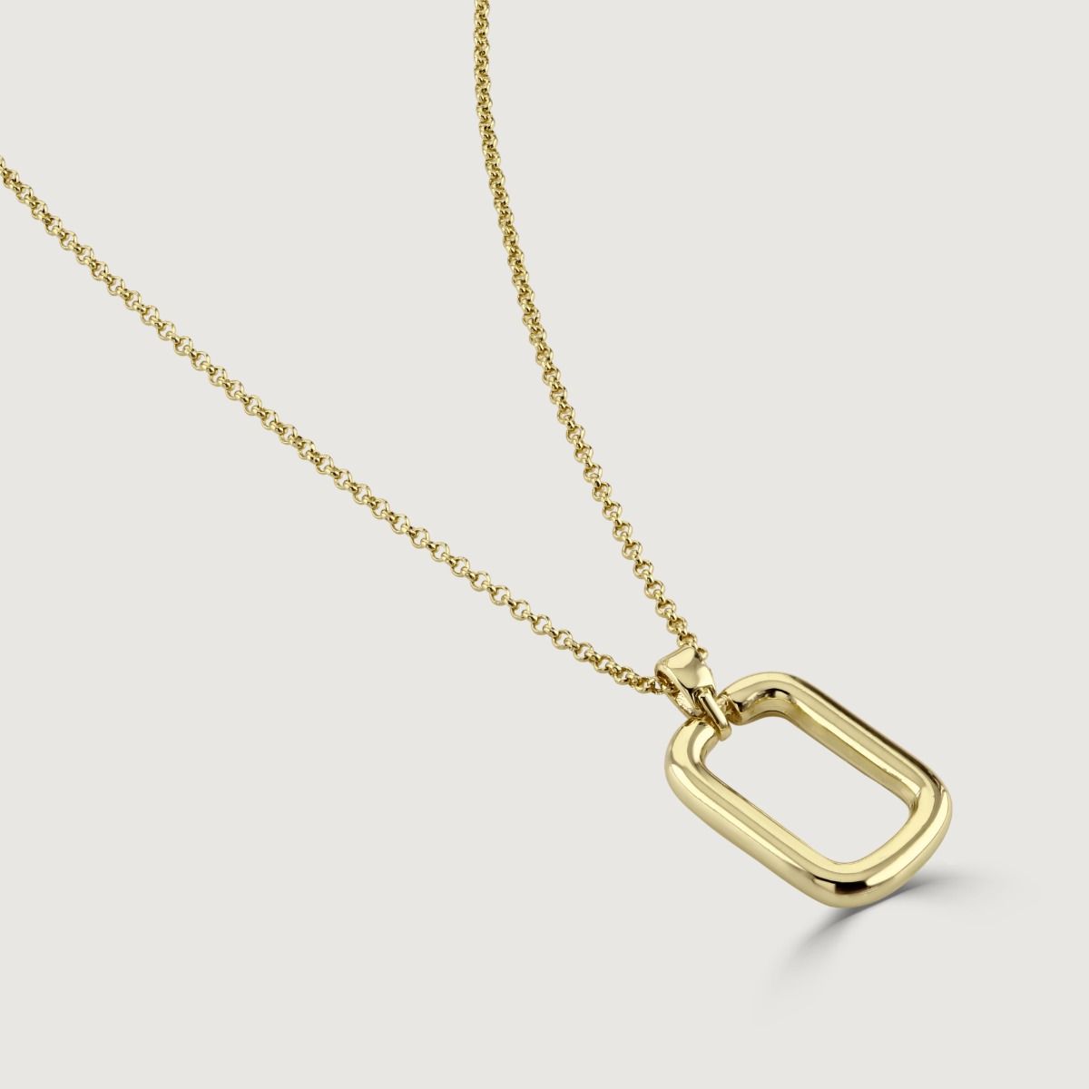 The Rectangle Polished Gold Hoop Pendant is a contemporary and sleek piece. With its polished gold finish and rectangular hoop design, this pendant exudes contemporary elegance. The geometric shape adds a touch of modernity. 