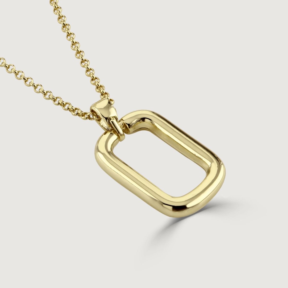 The Rectangle Polished Gold Hoop Pendant is a contemporary and sleek piece. With its polished gold finish and rectangular hoop design, this pendant exudes contemporary elegance. The geometric shape adds a touch of modernity. 