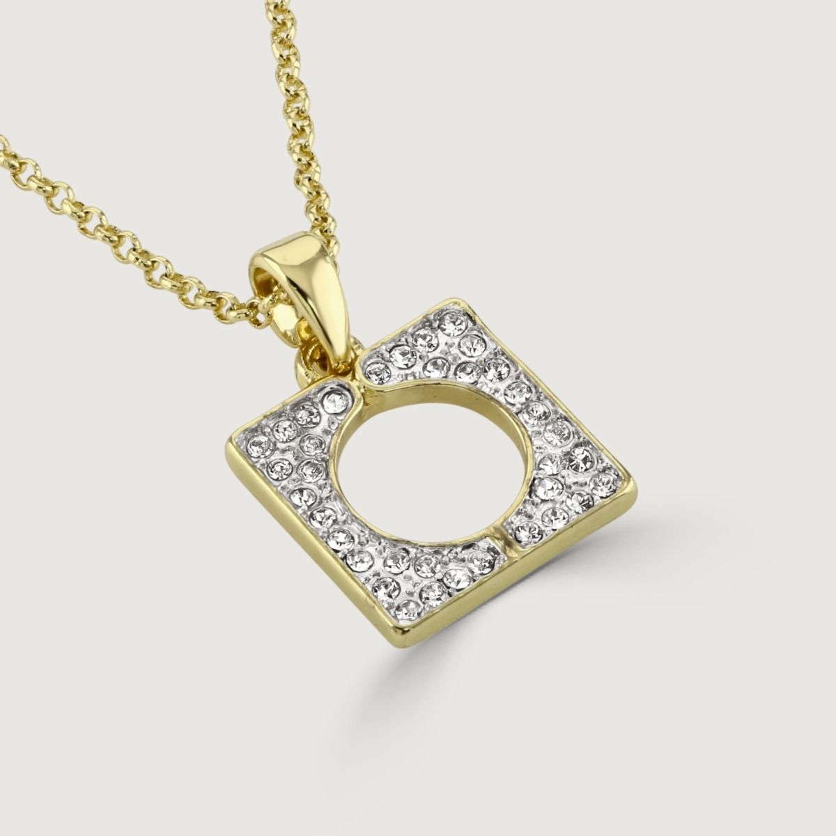 The Square Crystal Pendant is a captivating piece of jewellery that radiates elegance and brilliance. With its square shape and sparkling crystal centrepiece, this pendant exudes a refined charm. 