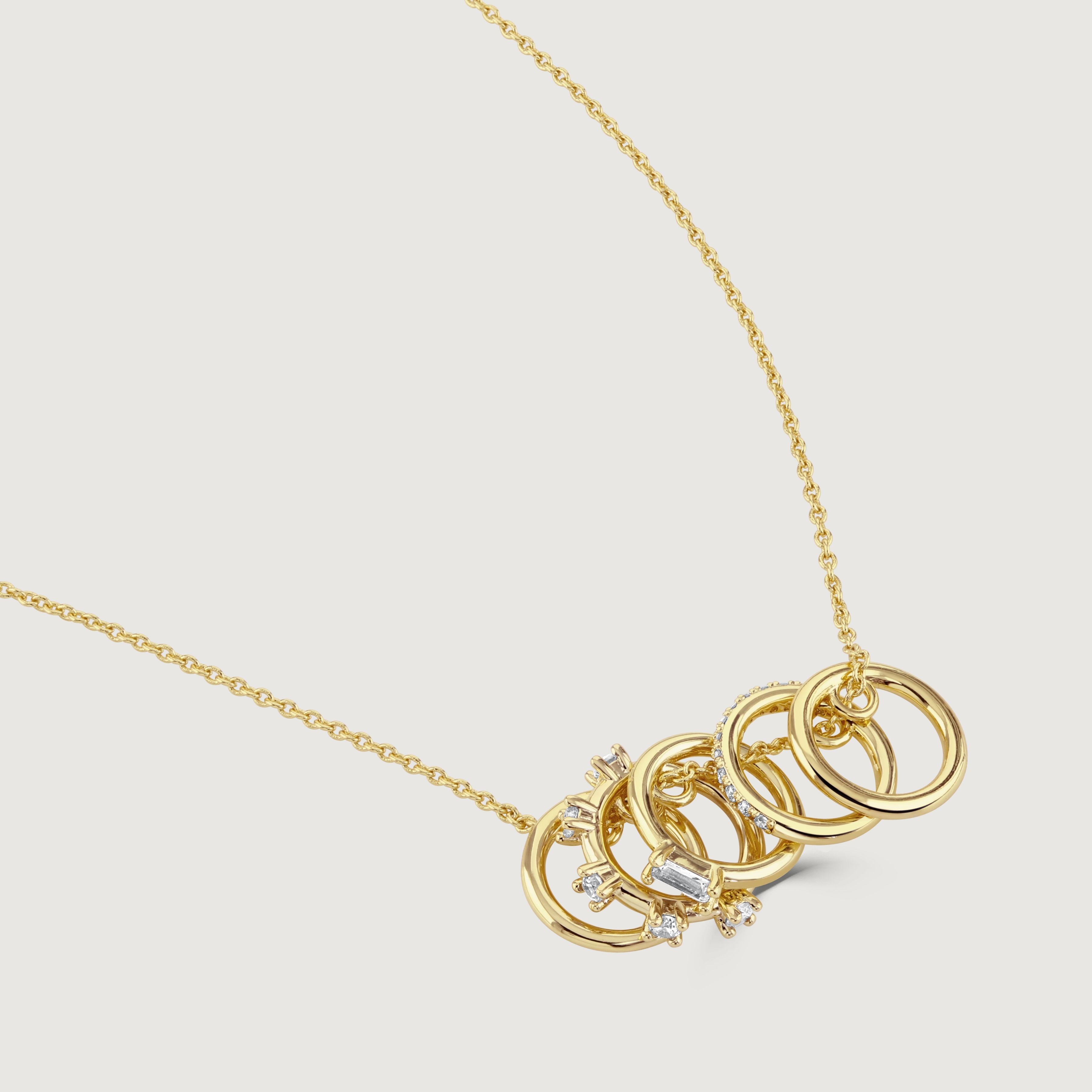 The crystal hoop pendant is a subtle way to introduce texture into your jewellery as it offers a contemporary twist on a timeless design. Teamed with a delicate chain, the plain and crystal band act as a great statement piece. 
