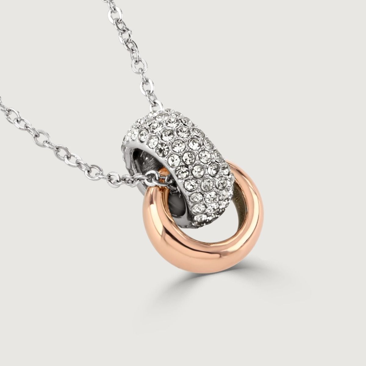 The polished crystal two-tone duo pendant is a bestseller. The pairing of the two-tone plating and crystals, allows this to be an everyday favourite.