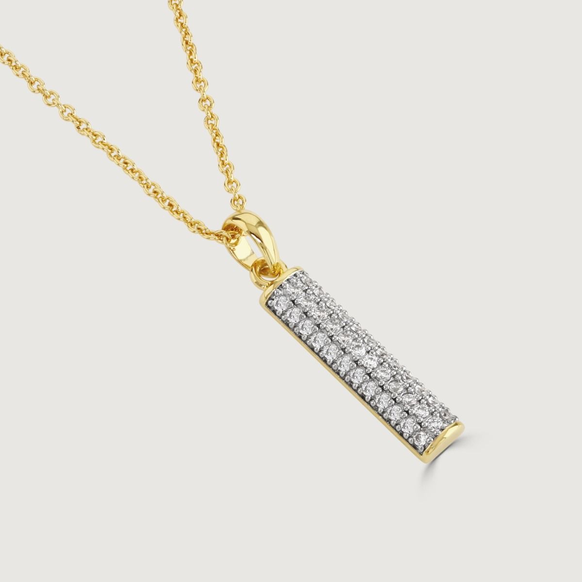 Elevate your elegance with the Pave Bar Necklace. Adorned with cubic zirconia, this necklace adds a touch of luxury to any ensemble. Its exquisite design and meticulous craftsmanship make it a must-have accessory for those who appreciate refined beauty.