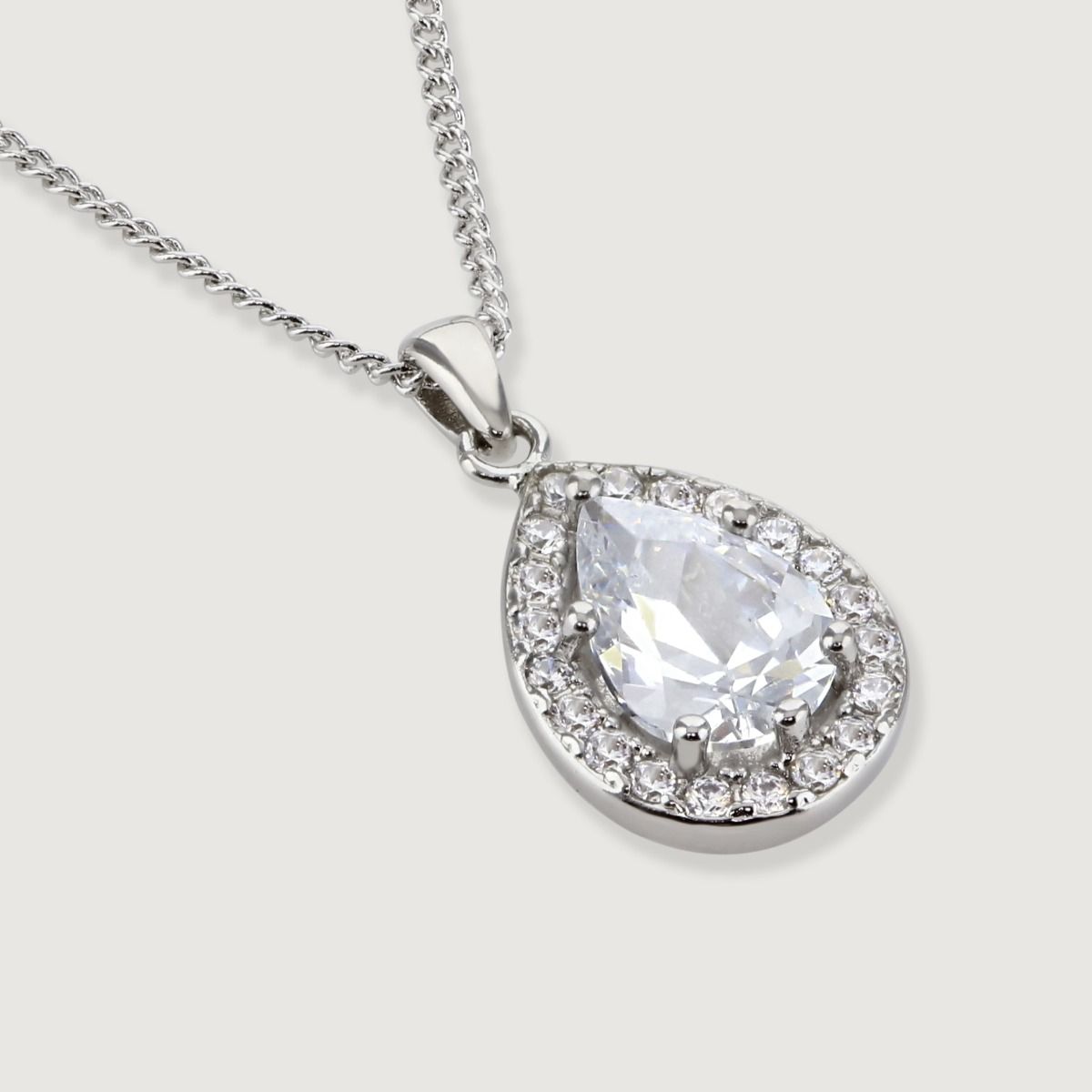 Elevate your elegance with our Clear Sparkle Pear Pendant. Meticulously crafted cubic zirconia stones frame a captivating canary pear cut centre, radiating sophistication. 