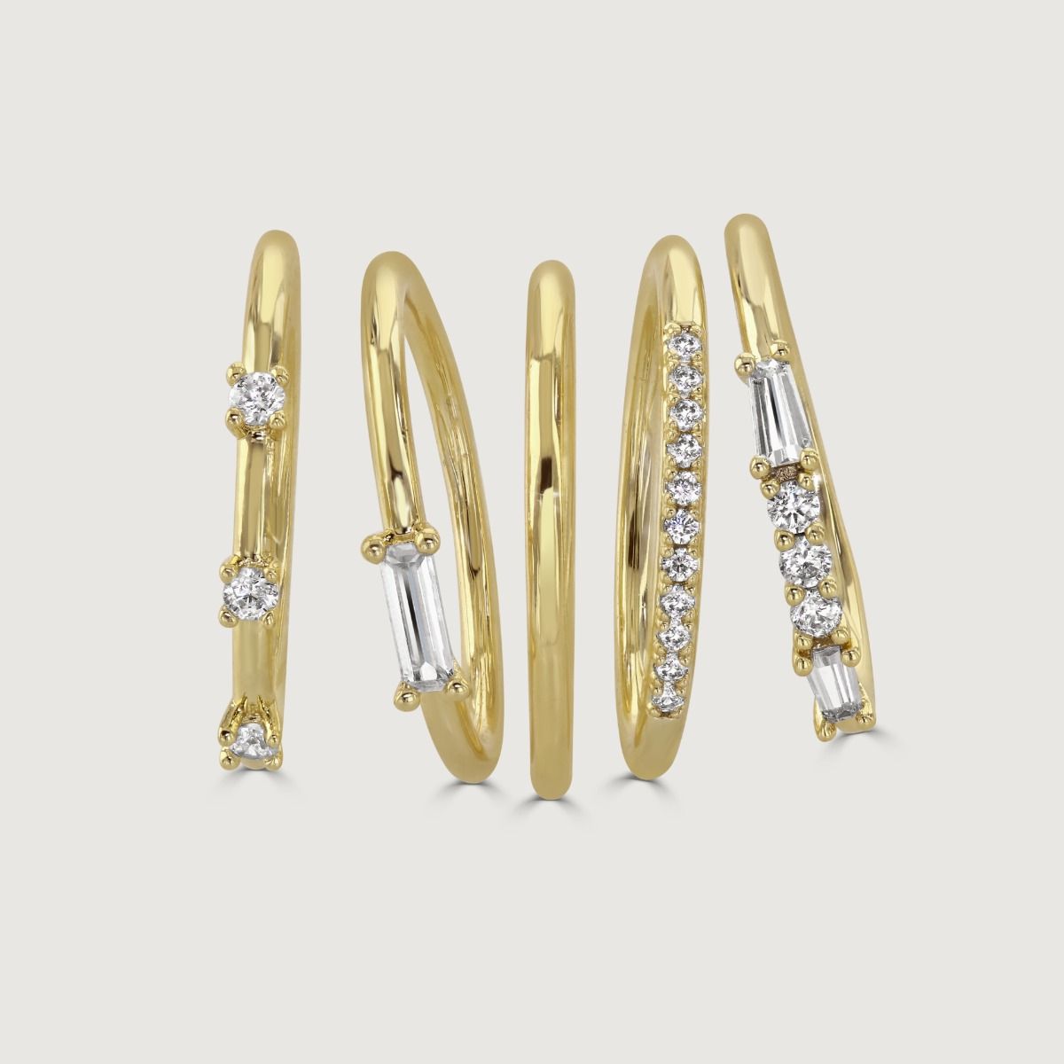 The 5 Piece Stacking Ring Set pairs a plain band with an array of crystal arrangements. These are the ultimate bestseller, as it allows you to wear each ring separately and mix and match. 
