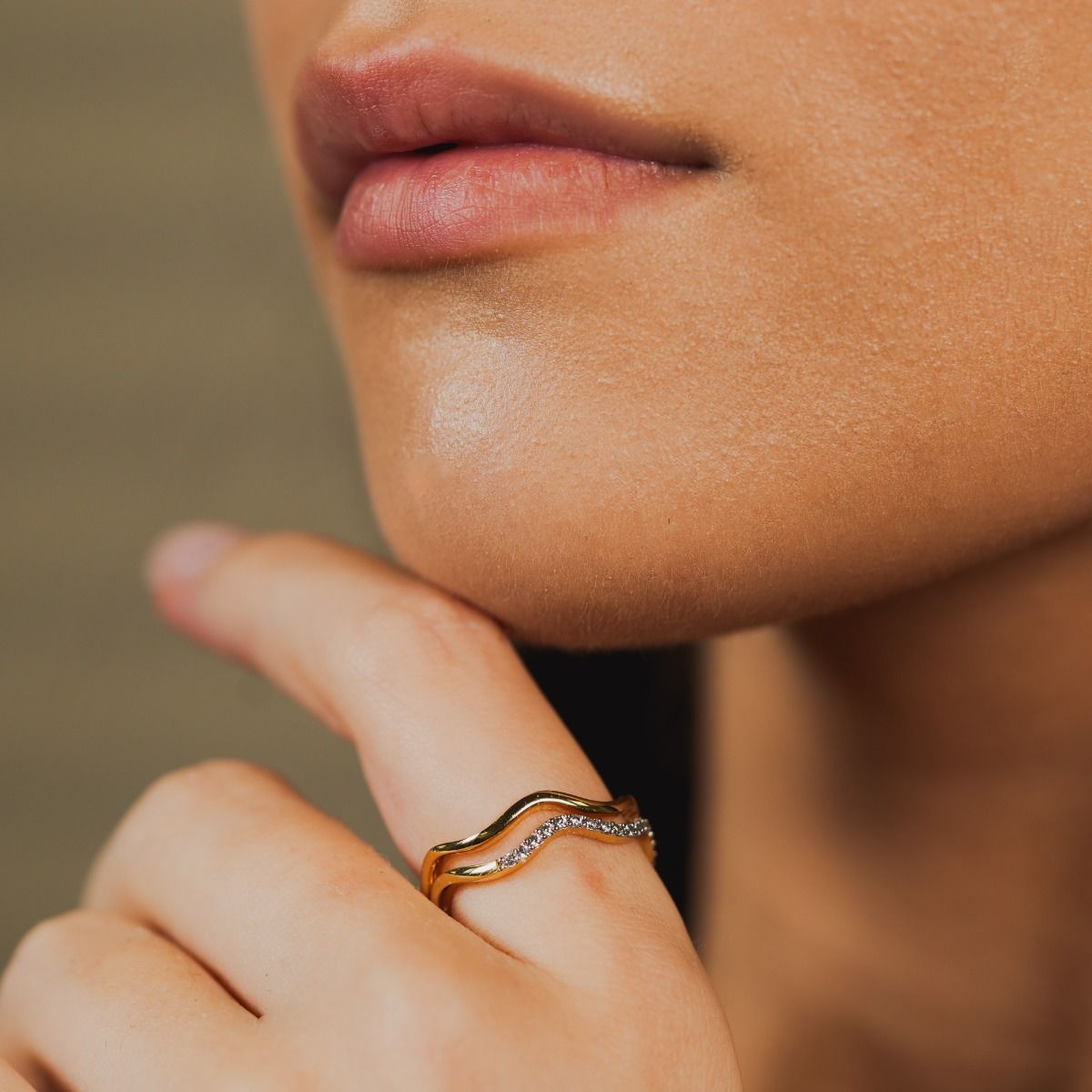 Elegantly crafted, the Two-Tone Double Pave Wave Ring combines a polished wave band with a two-tone pave wave band. This chic design offers both comfort and contrast, gracing your finger with timeless style and sophistication.