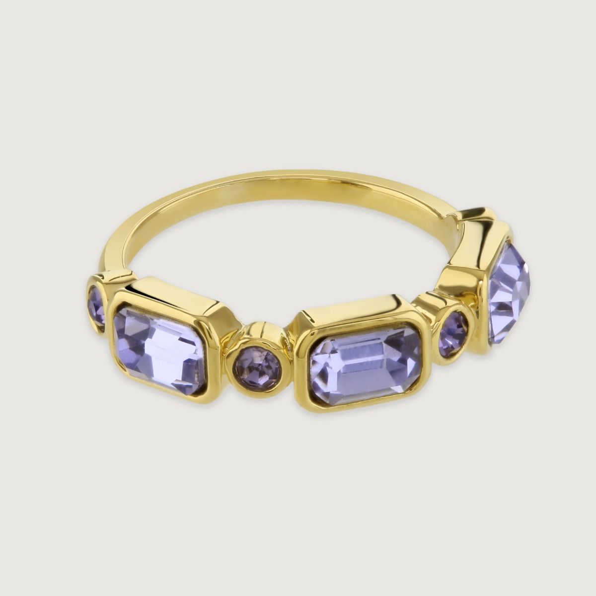 The Geometric Ring showcases masterful craftsmanship with geometric bezel set stones which are placed on a delicate band. Versatile and eye-catching, this piece complements any style, making it perfect to wear with plain stacking rings or to stand alone a