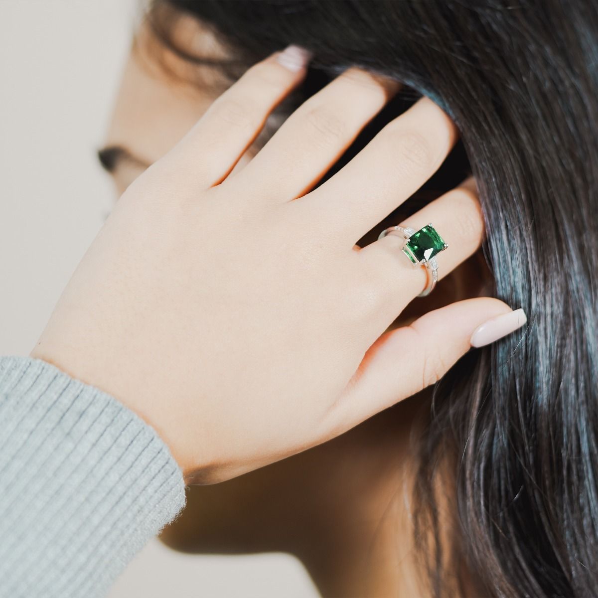 The Emerald Baguette with Tapered Baguette Shoulder Ring is a stunning art deco inspired ring featuring an immaculate baguette cut central glass stone, with tapered stone baguette sides flawlessly faceted for maximum sparkle.