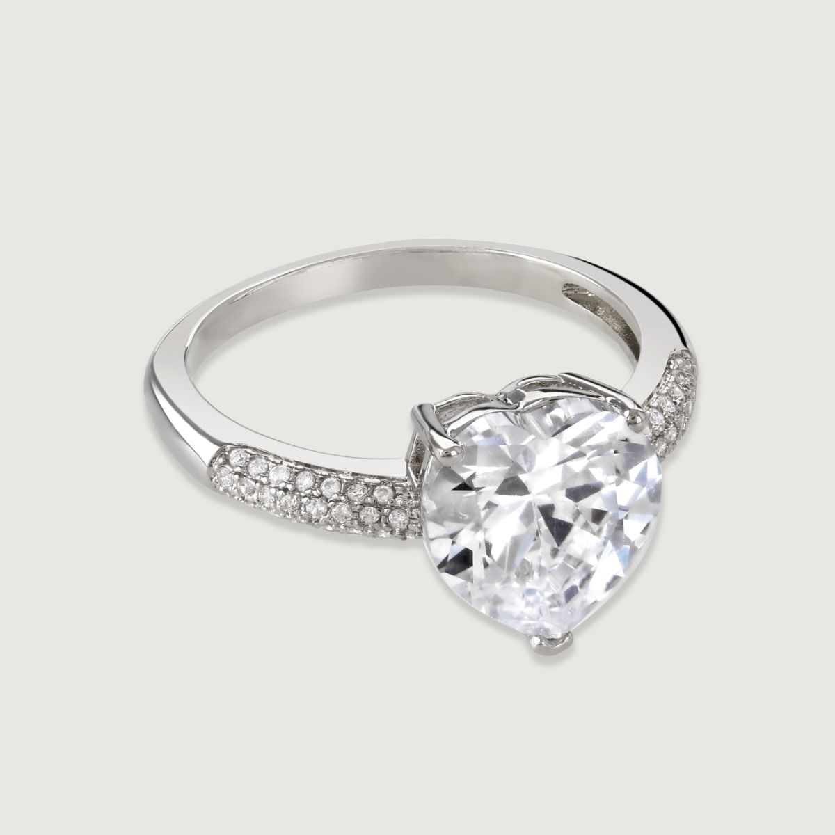 A truly stunning trinity ring featuring a trio of brilliant cut cubic zirconia stones flawlessly faceted to reflect the light for diamond inspired look. This beautiful ring brings eye catching elegance to every occasion.