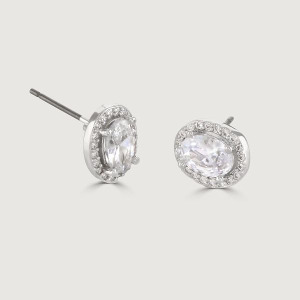 These dazzling stud earrings are set with a halo of flawlessly cut cubic zirconia stones, surrounding a sparkling round clear centre stone. Wear to add timeless glamour to any look.