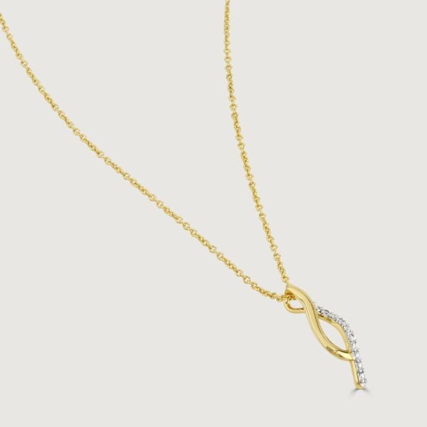 Elevate your style with the Two-Tone Pave and Polished Tide Necklace. Crafted with precision, this necklace showcases intertwining gold-polished and cubic zirconia pave bands, creating a captivating organic design. 