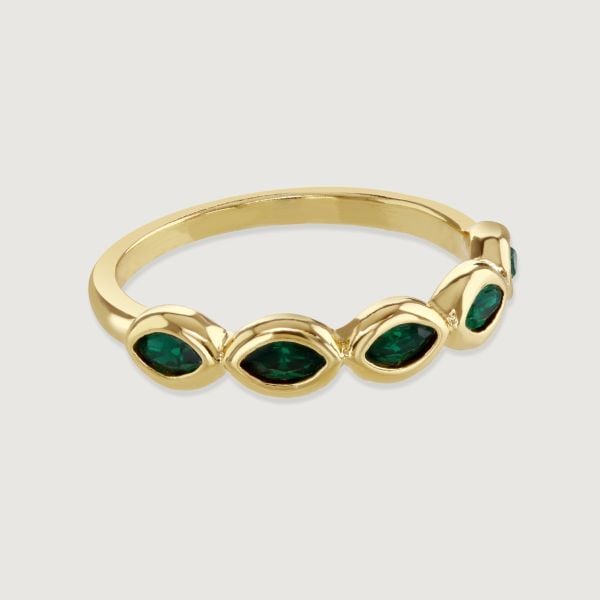 The Stacking Ring flaunts a delicate band adorned with encased marquise stones. Its versatility lends it the ability to stand out as a statement piece or be customised by pairing with complementary rings.